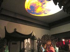 Moon In The Water reflected in China: Through the Looking Glass